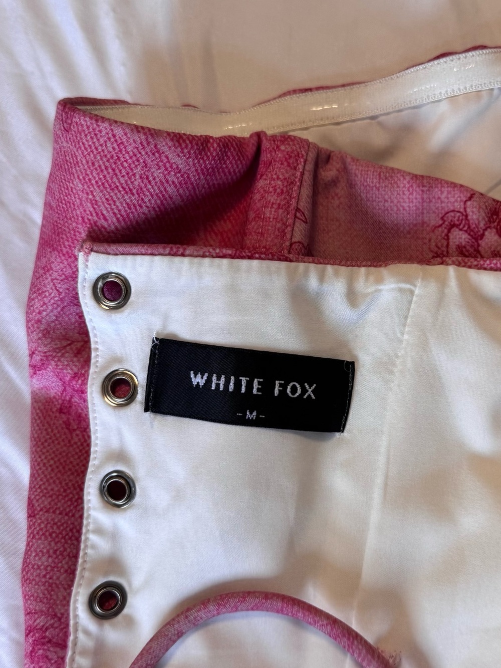 White Fox Boutique Pink White Crop Top with Grommet Detail